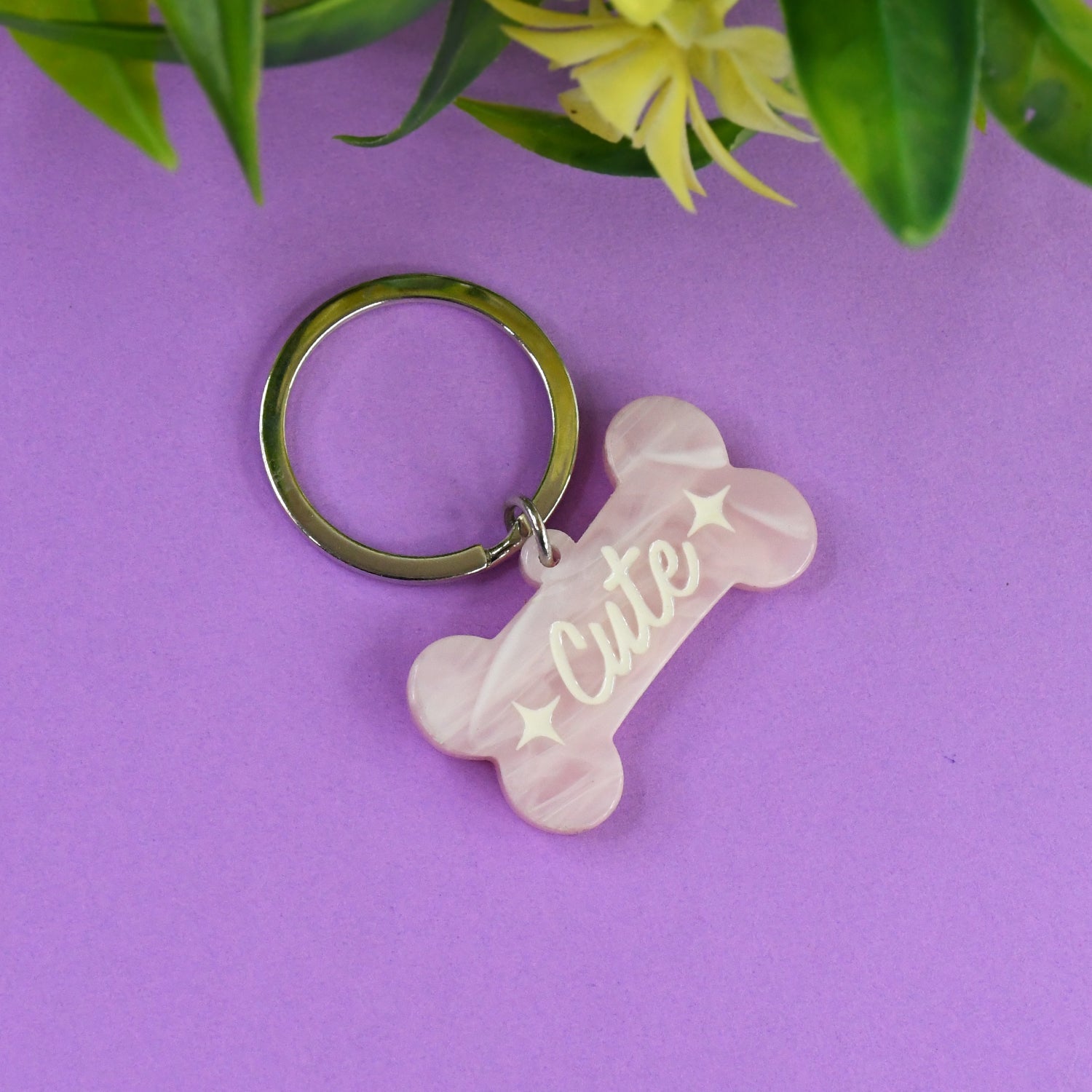 Cute Bone-Shaped Acrylic Keychain with Stylish Typography